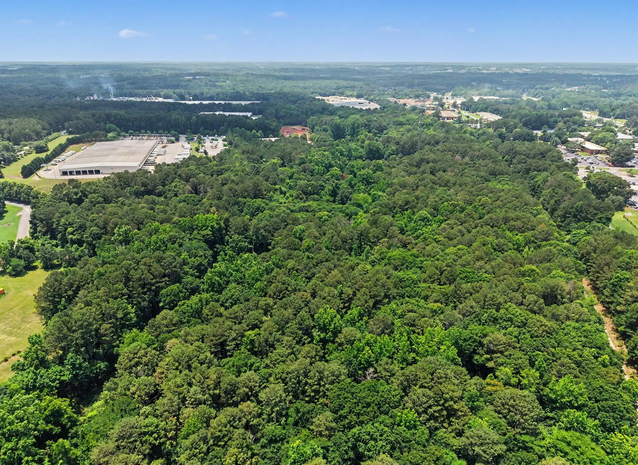 04 Wide Aerial Over The Wooded Tract